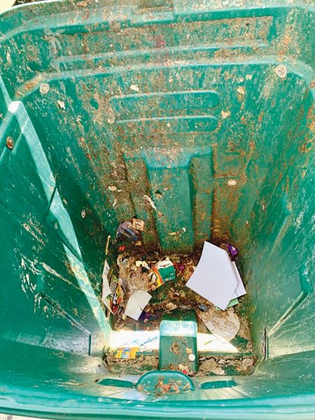 Inside a dirty trash bin